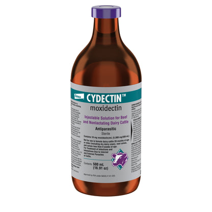 An amber plastic bottle of Cydectin Moxidectin injectable solution for beef and monstaging dairy cattle, featuring a purple cap and a white label with teal and purple text.